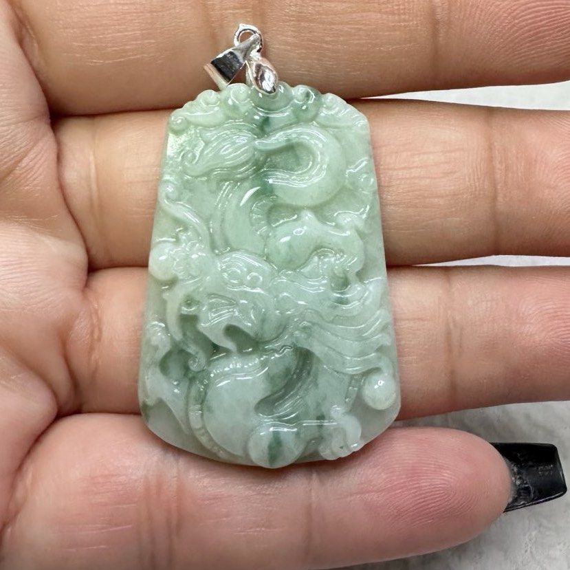 Carved jade top dragon pendant