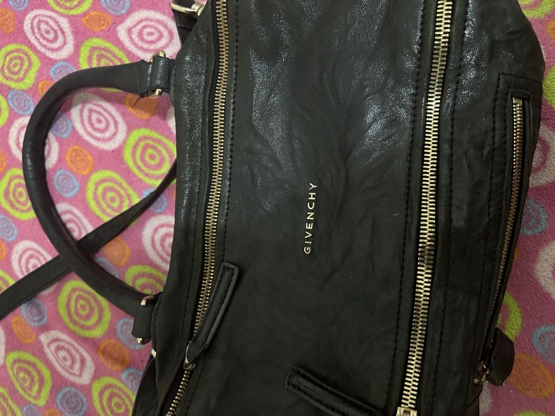 Authentic givenchy pandora (Category: Luxury Bags & Wallets) located in Mandaluyong City. Submitted by prelovedbytim (Listing ID 1276966928, Image 2). Description: With signs of everyday use.