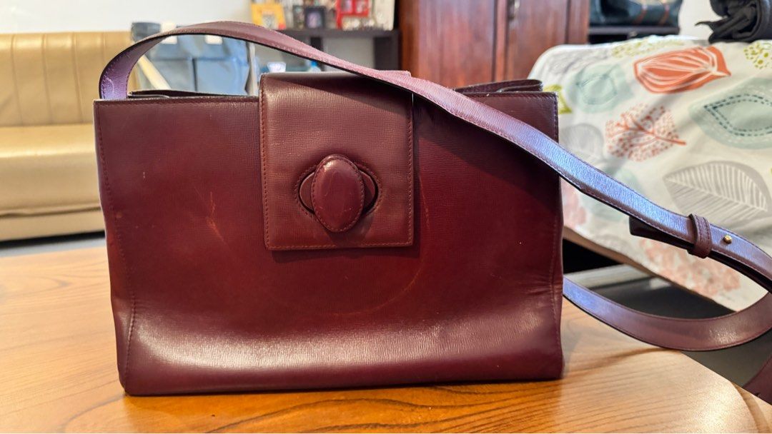 Cartier Vintage Bag (Category: Luxury Bags & Wallets) located in Pasig City. Submitted by jamilaquai1 (Listing ID 1276896226, Image 2). Description: Please note the discolouration in front but not as noticeable. Purchased here in Carousel so I’m not sure of authenticity. Cartier Vintage Shoulder Bag.