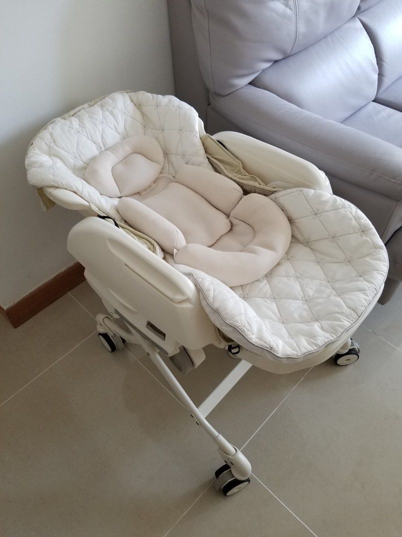 Combi auto swing high chair best sale