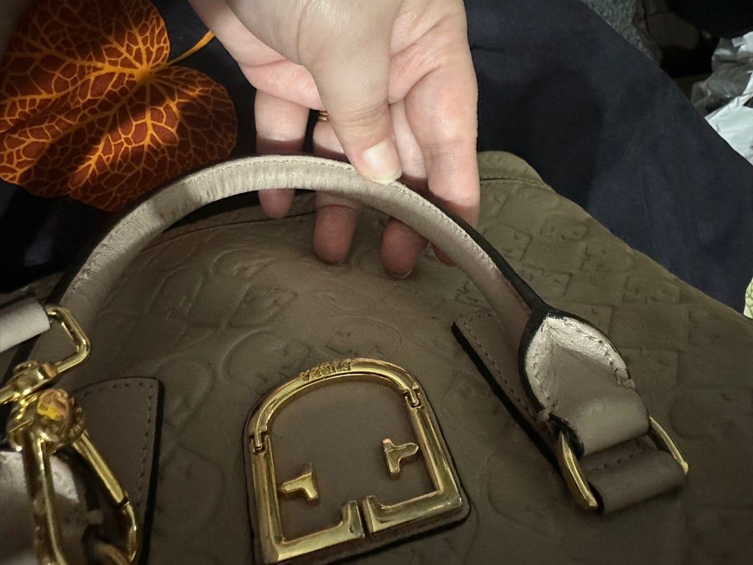 Furla bag with sling (Category: Luxury Bags & Wallets) located in Quezon City. Submitted by cherry_hailey (Listing ID 1095773769, Image 3). Description: Pre loved Authentic Fantastica Dome with strap and dust bag.