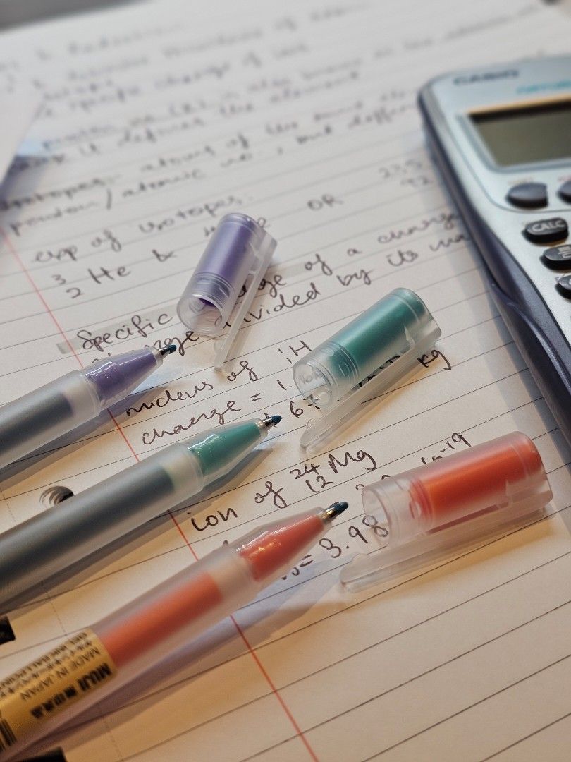 muji gel ink ballpoint pen cap type 0.5 purple green and orange