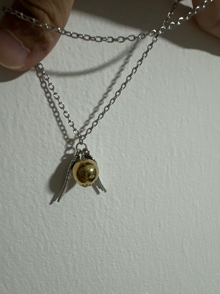Golden snitch locket best sale necklace