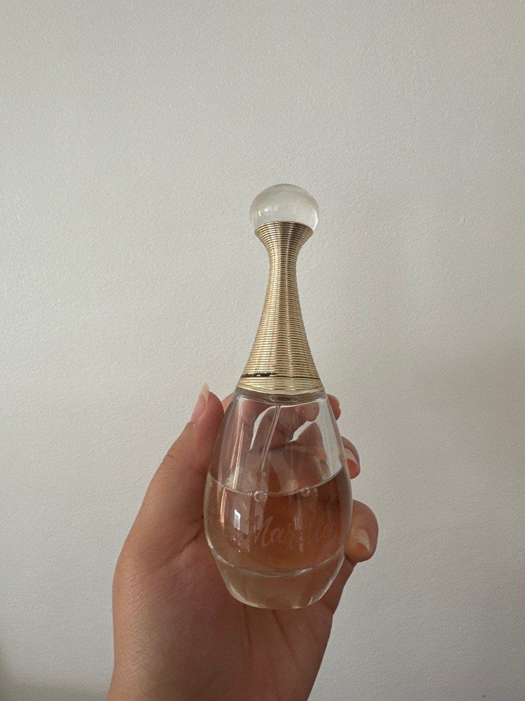 J’adore by Christian Dior (Category: Fragrance & Deodorants) located in Cavite. Submitted by raesukay (Listing ID 1276802594, Image 1). Description: Seen flaws and slight fading, with engraved name..