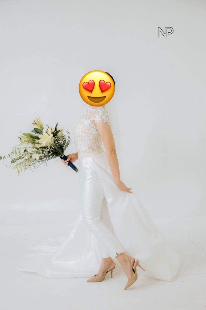 Jumpsuit 2 in 1 Wedding Couture (Category: Jumpsuits) located in Pasig City. Submitted by mc.gg28 (Listing ID 1276926376, Image 1). Description: Selling this Atelier custom made 2 in 1 Wedding Couture, Veil not included it was damaged after dry cleaned. I can include the Aldo heels worn on the photo Asking price 10,000 negotiable, dry cleaned. Fits XS (34-24-35) Shoe size US 7.5.