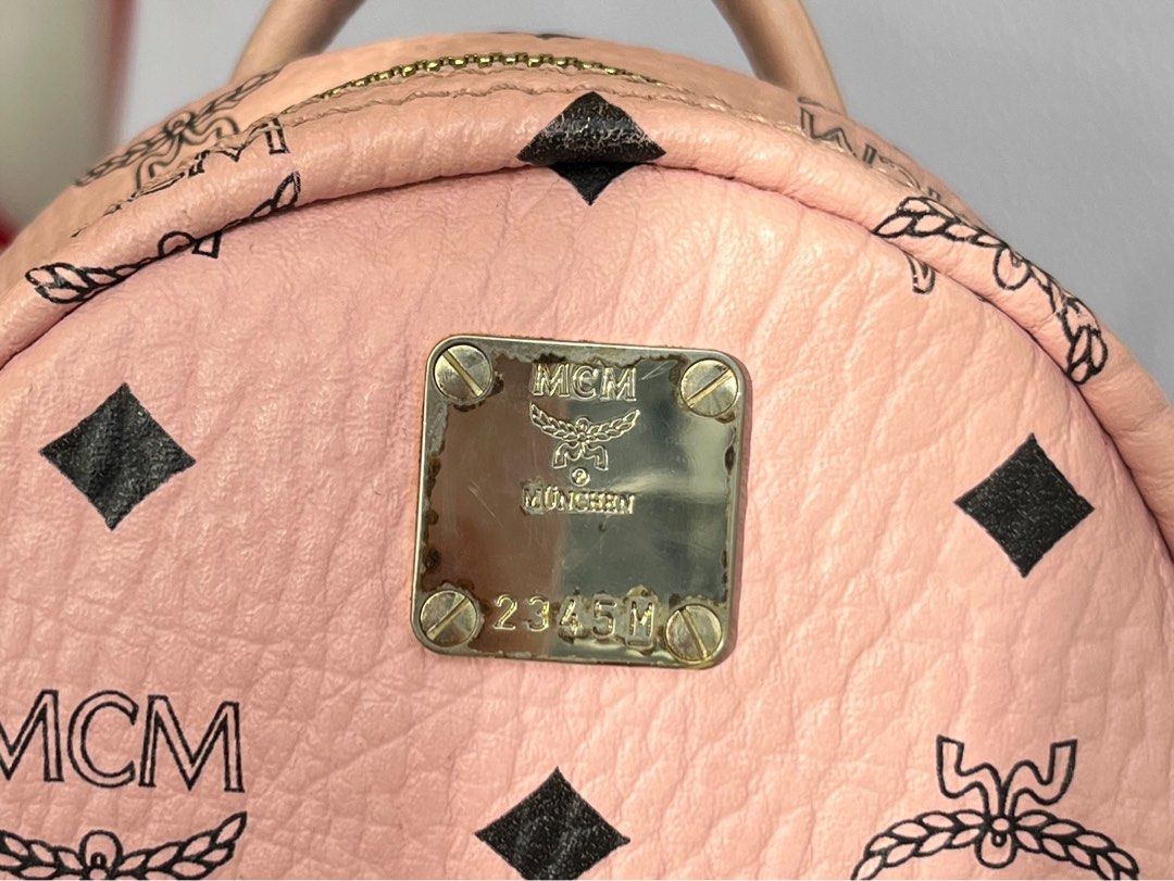 Mcm mini hotsell pink leather backpack