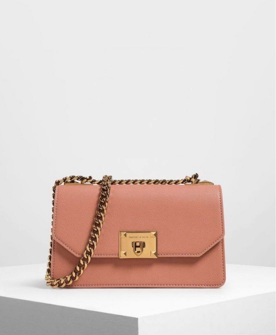 Metal push sale lock crossbody bag
