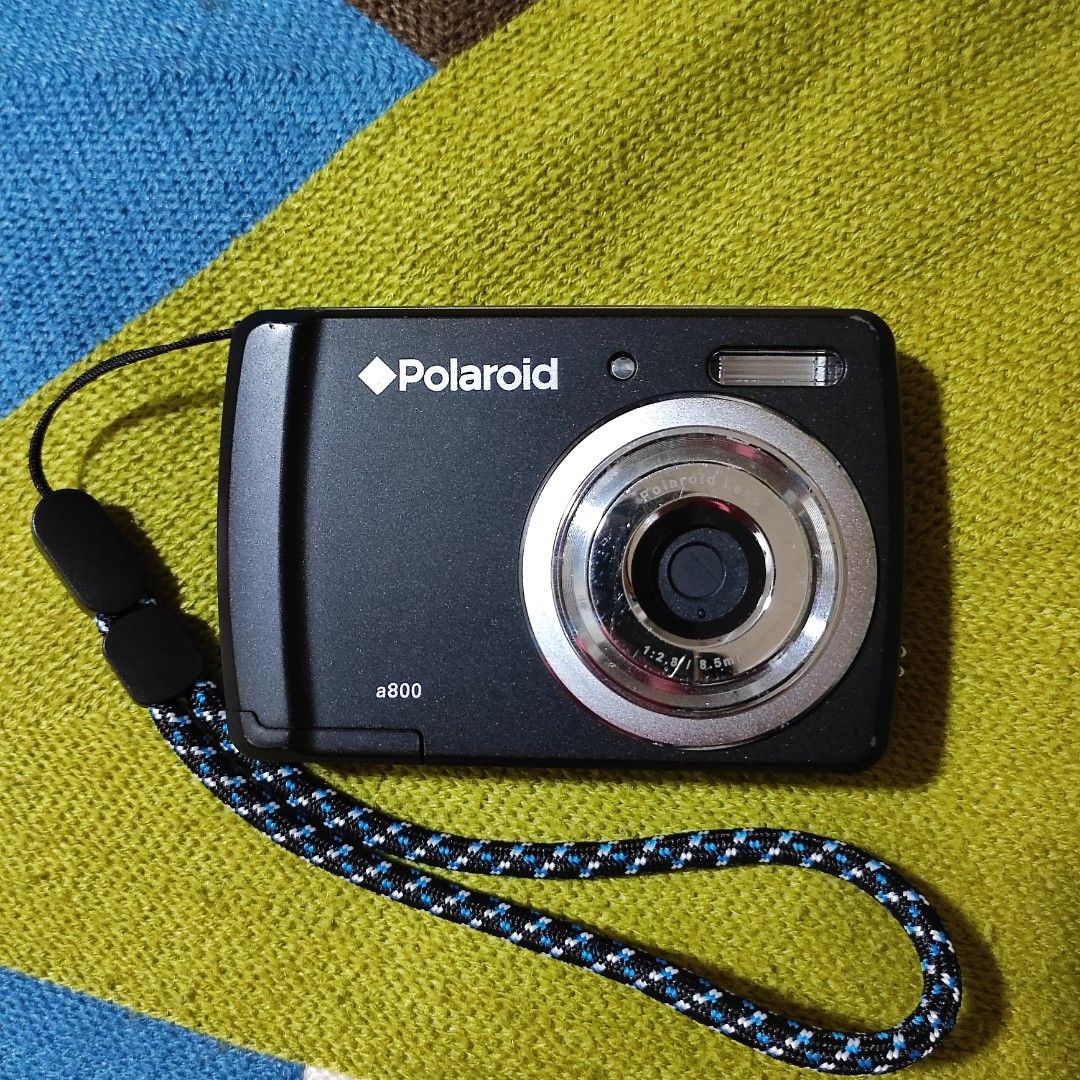 Polaroid a800 digital camera (Category: Cameras) located in Sorsogon. Submitted by aj.maximo (Listing ID 1277044540, Image 1). Description: 10/10 working condition fully functional, no issues can take videos minor scratches uses 2 AAA batteries inclusions: unit and strap only.