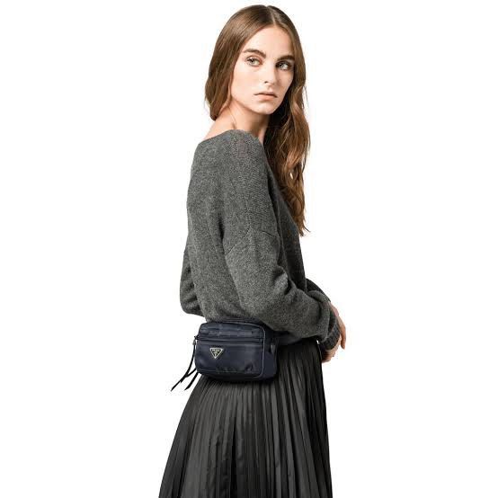 Prada beltbag crossbody bag (Category: Luxury Bags & Wallets) located in Taguig. Submitted by rraaa32 (Listing ID 1276909754, Image 2). Description: Used once can pass as bnew Rare / discontinued hard to get piece Dark blue sometimes black depends on light W/ dustbag and authenticity card.