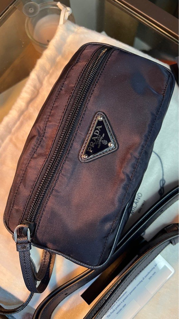 Prada beltbag crossbody bag (Category: Luxury Bags & Wallets) located in Taguig. Submitted by rraaa32 (Listing ID 1276909754, Image 3). Description: Used once can pass as bnew Rare / discontinued hard to get piece Dark blue sometimes black depends on light W/ dustbag and authenticity card.