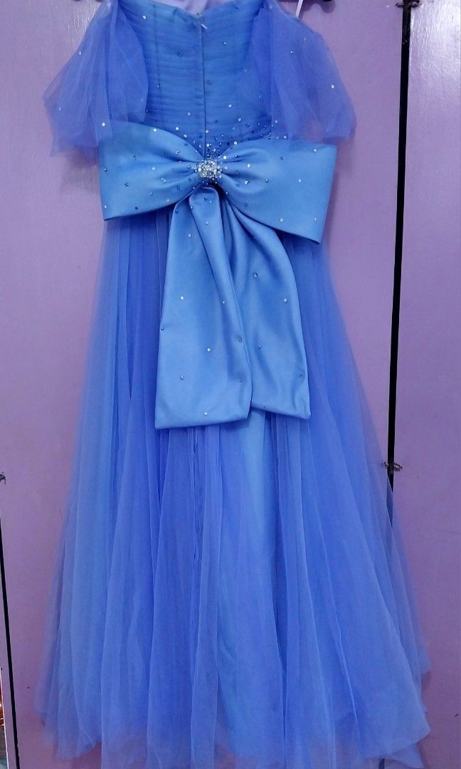 Purple Gown (Category: Evening dresses & gowns) located in Manila. Submitted by jl.stuffph (Listing ID 1276803764, Image 2). Description: Used once ng daughter ko sa kasal last December for Flower girl Pinatahi sya for 7,500 Selling it for 3,500 🎉 13yrs old daughter ko 5'7 ang height Loc: Tondo Manila.