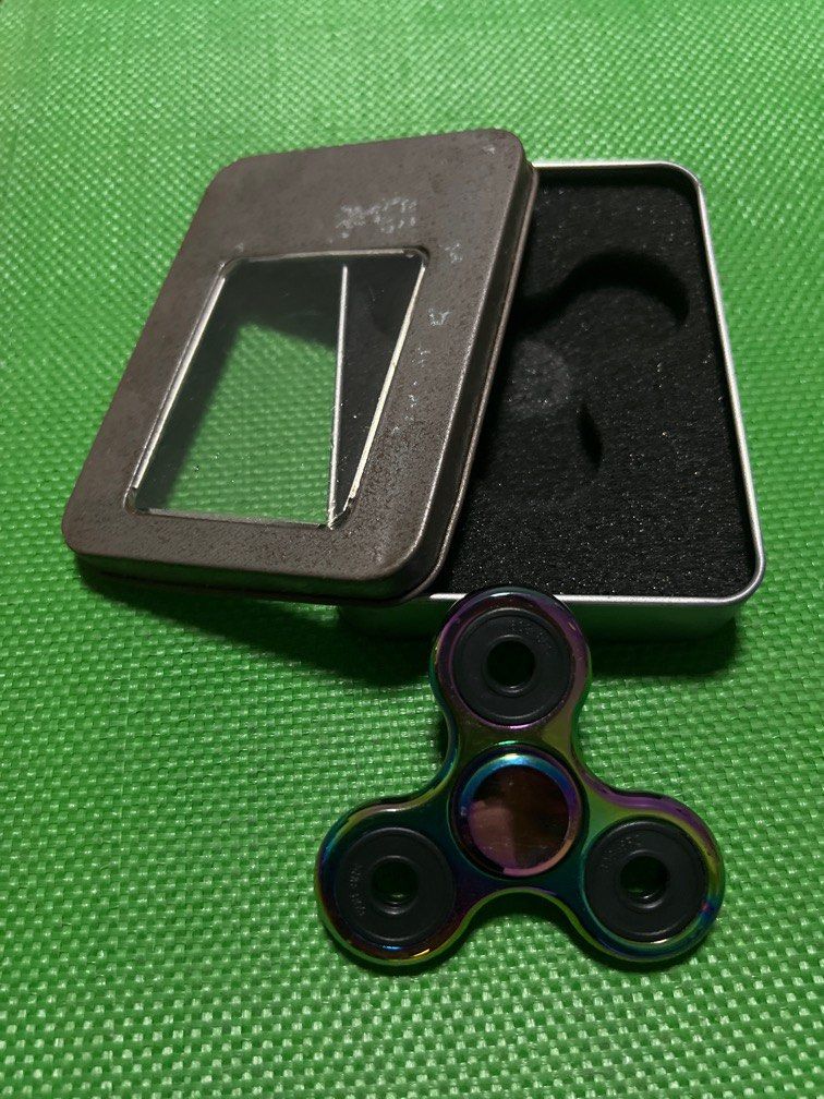 Rainbow fidget spinner, Hobbies & Toys, Toys & Games on Carousell