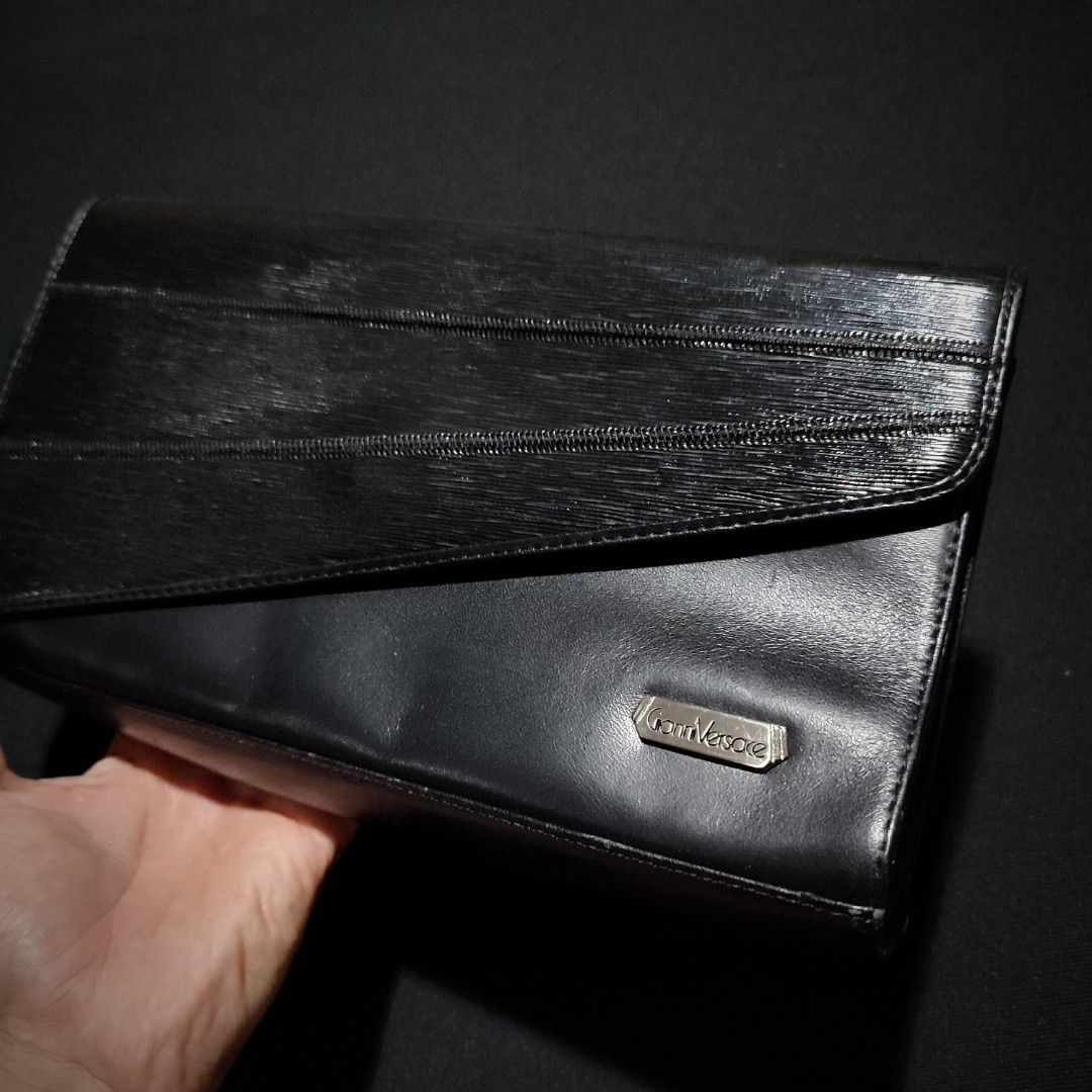 Versace Clutch/pouch bag (Category: Luxury Bags & Wallets) located in Taytay. Submitted by highendmnl (Listing ID 1276918528, Image 3). Description: Versace Clutch Bag 11" x 6" size dimension Unisex excellent used condition.