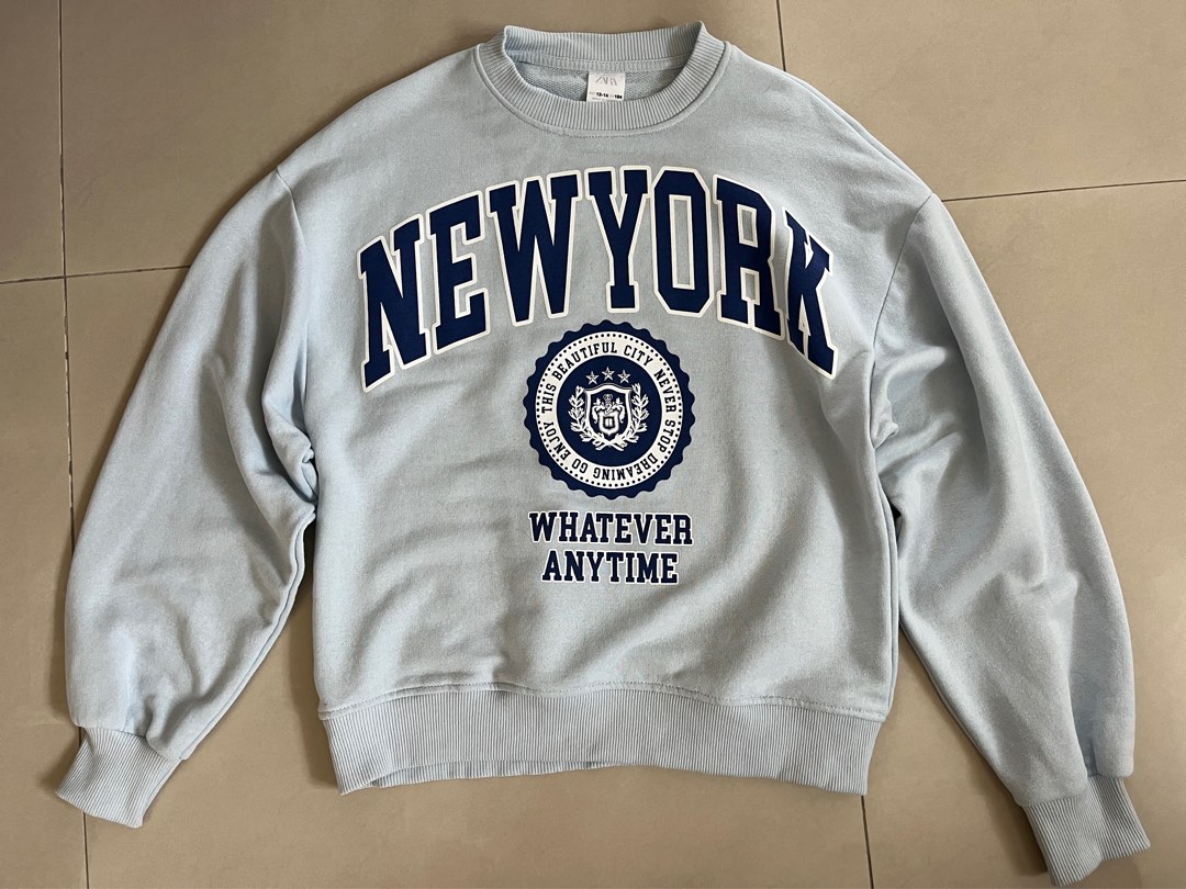 Champion sweater logo discount all over zara