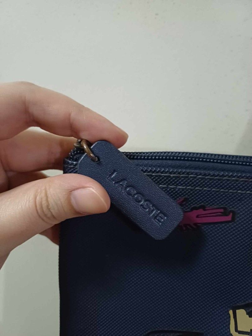 Lacoste bag fake vs original deals