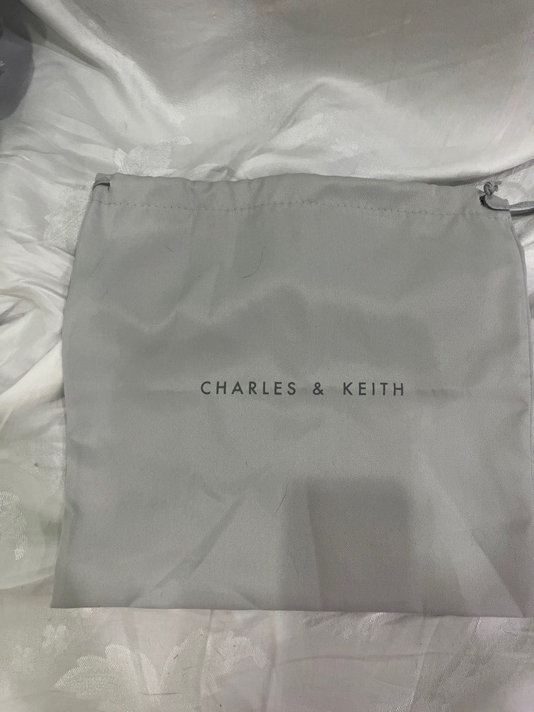 Dust bag top charles and keith