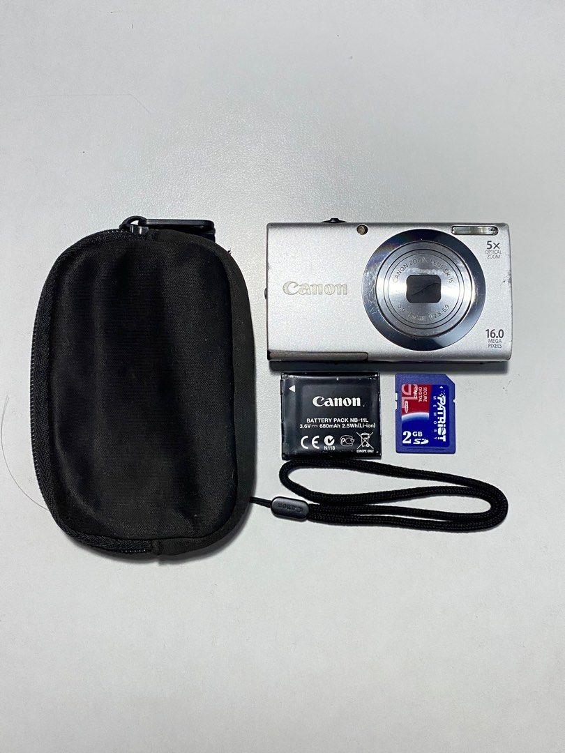 Digital Camera Canon Powershot A2400 (Category: Cameras) located in Valenzuela. Submitted by alfeopaulramos7490 (Listing ID 1277340214, Image 1). Description: Canon Powershot A2400 16.0 megapixel P6,999 +sf Inclusion: * Canon A2400 body * original canon battery * original canon wrist strap * SD card * pouch * clip charger 100% all working All buttons are crispy no hard press Flash working Honest issue: tolerable and minor burnt screen, see 4th an