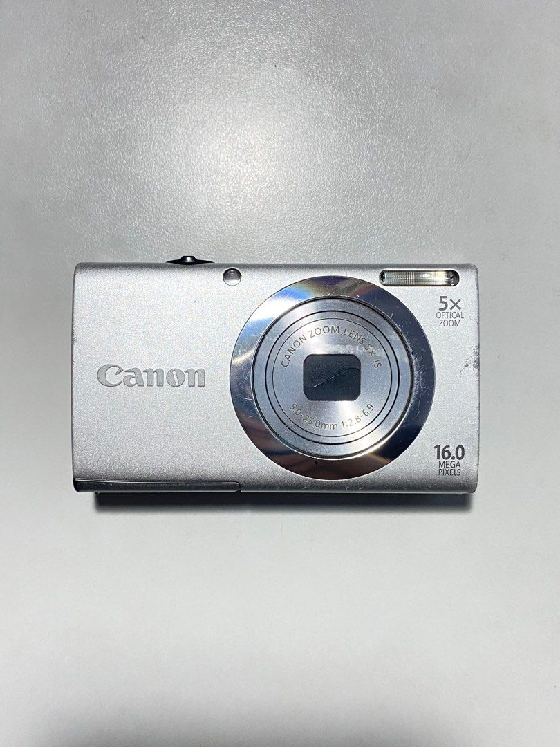 Digital Camera Canon Powershot A2400 (Category: Cameras) located in Valenzuela. Submitted by alfeopaulramos7490 (Listing ID 1277340214, Image 2). Description: Canon Powershot A2400 16.0 megapixel P6,999 +sf Inclusion: * Canon A2400 body * original canon battery * original canon wrist strap * SD card * pouch * clip charger 100% all working All buttons are crispy no hard press Flash working Honest issue: tolerable and minor burnt screen, see 4th an