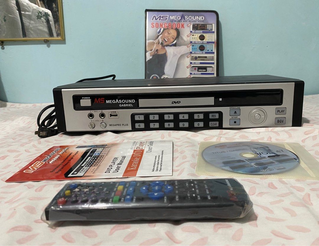 DVD Karaoke Player (Category: Portable Music Players) located in Imus. Submitted by nhelsg2 (Listing ID 1277125701, Image 2). Description: Defective Megasound DVD Karaoke Player. ( Complete set ) Issue: No power, not working . This listed for parts or repairs. Please view all pictures for better description and contents. Buy it for repairs, or to repair it. No swap/trade & meet ups. No return, no exchange. Payment via gcash, paymaya or coins.ph S