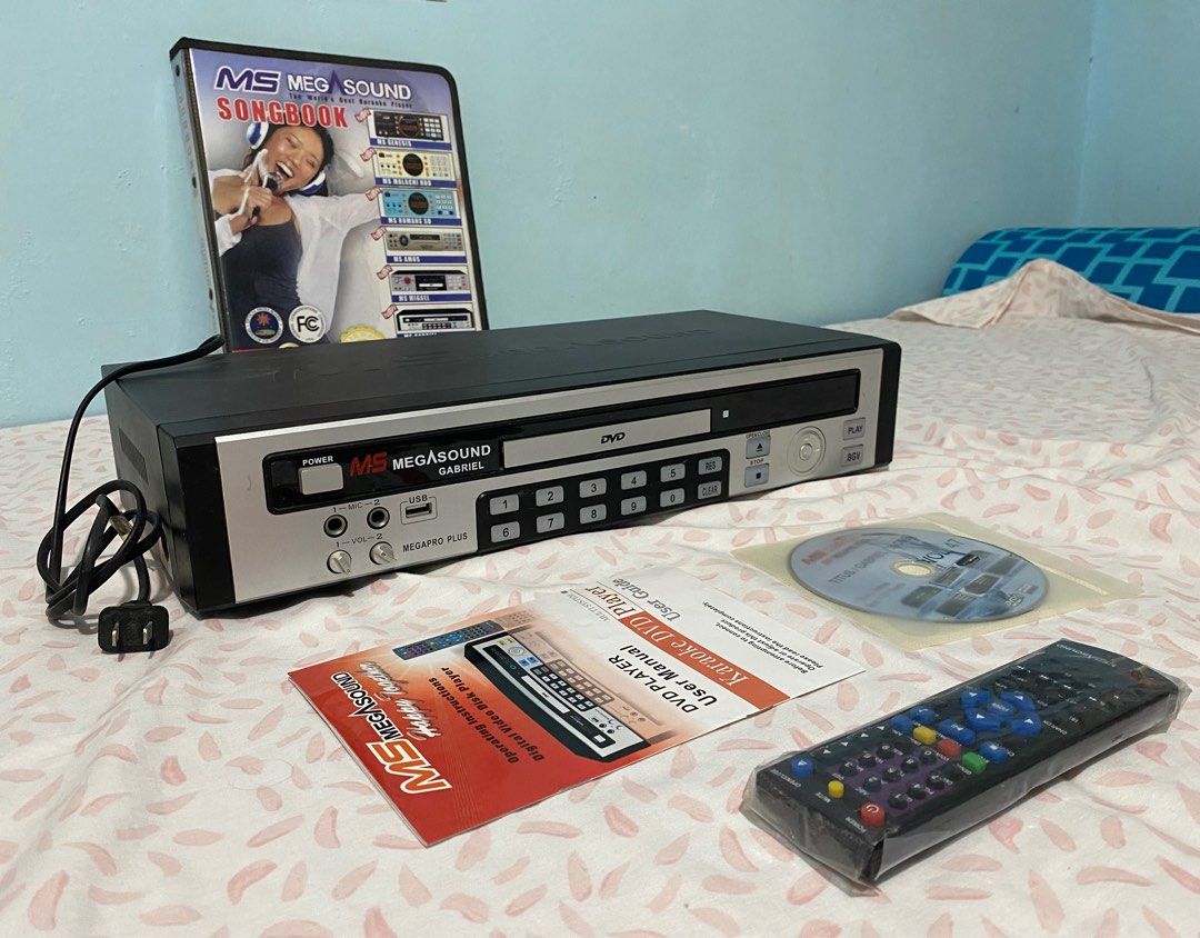 DVD Karaoke Player (Category: Portable Music Players) located in Imus. Submitted by nhelsg2 (Listing ID 1277125701, Image 3). Description: Defective Megasound DVD Karaoke Player. ( Complete set ) Issue: No power, not working . This listed for parts or repairs. Please view all pictures for better description and contents. Buy it for repairs, or to repair it. No swap/trade & meet ups. No return, no exchange. Payment via gcash, paymaya or coins.ph S