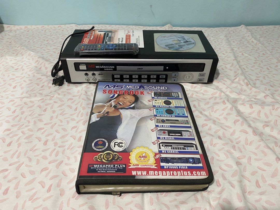 DVD Karaoke Player (Category: Portable Music Players) located in Imus. Submitted by nhelsg2 (Listing ID 1277125701, Image 1). Description: Defective Megasound DVD Karaoke Player. ( Complete set ) Issue: No power, not working . This listed for parts or repairs. Please view all pictures for better description and contents. Buy it for repairs, or to repair it. No swap/trade & meet ups. No return, no exchange. Payment via gcash, paymaya or coins.ph S