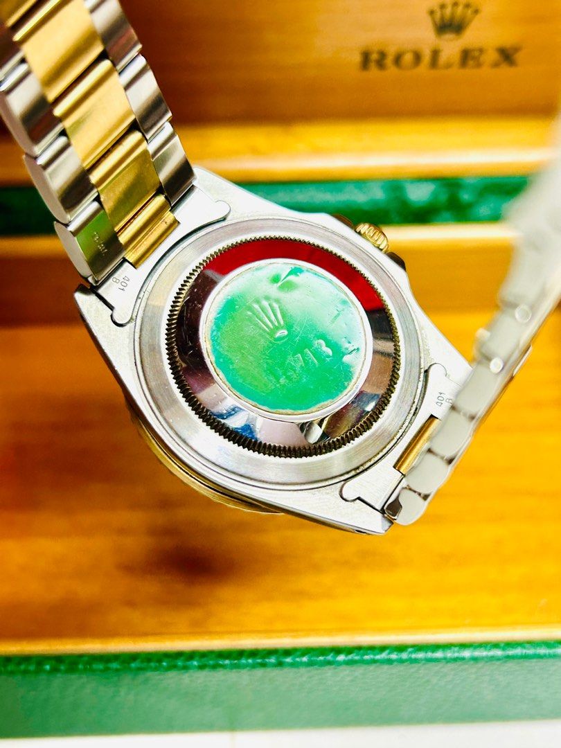 Green sticker on sales back of rolex