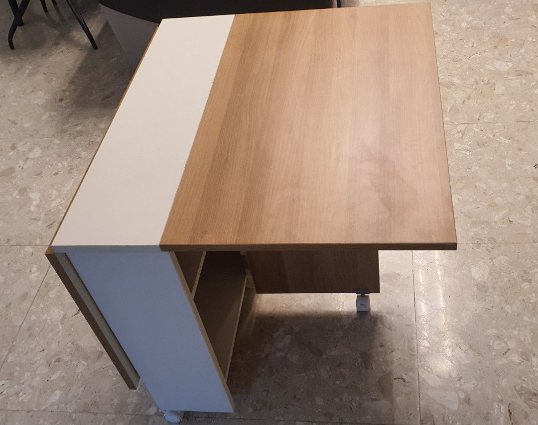 Extendable table (Category: Tables & Sets) located in Singapore. Submitted by 9preciousmoments9 (Listing ID 1277237264, Image 3). Description: Extendable table Both side extend, length is 120cm Either one side extend, length is 70cm Without extending, length is 25cm As-is condition Please arrange your own transport.