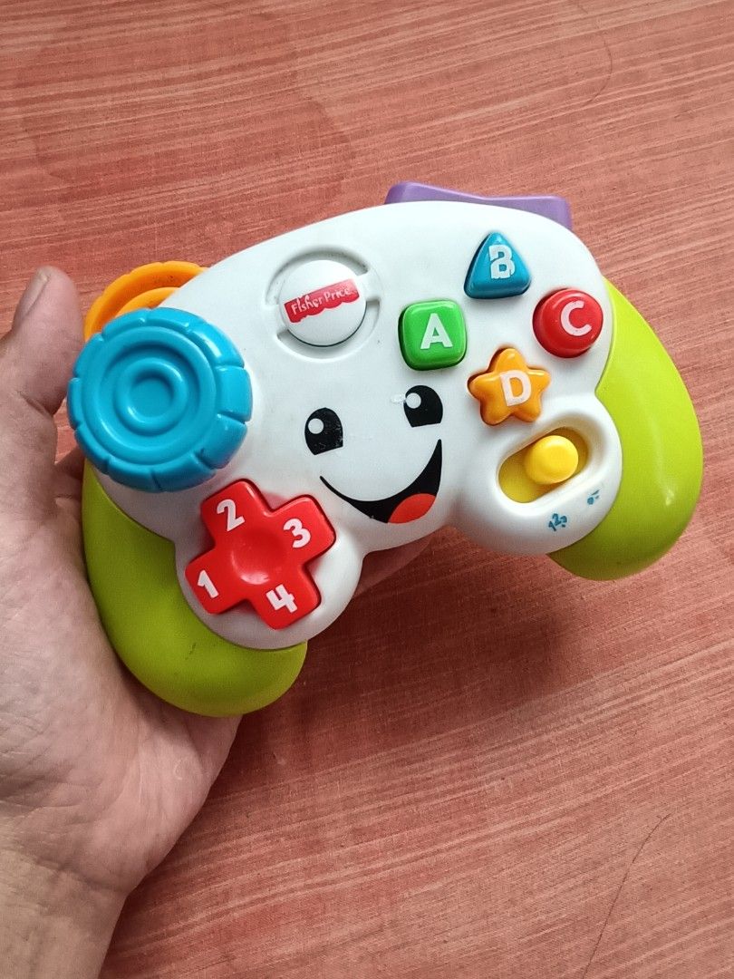 Fisher price game controller toy (Category: Kids Toys) located in Iligan City. Submitted by shehabdor98515 (Listing ID 1277148340, Image 2). Description: SOLD PER PIECE‼️‼️‼️♥️ working both♥️❣️‼️.