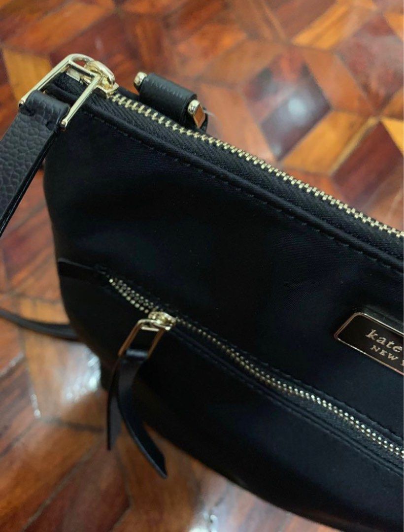 Kate Spade Black Nylon Crossbody Bag (AUTHENTIC) (Category: Luxury Bags & Wallets) located in Quezon City. Submitted by jellyaceeyoo (Listing ID 1277300225, Image 2). Description: •Price is slightly negotiable •Will not send more pictures in chat as detailed pictures are already provided •Payment: GCash •Delivery: Same-day delivery/ Courier .
