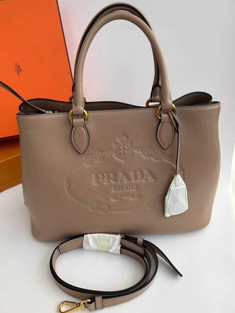 Prada twoway leather (Category: Luxury Bags & Wallets) located in Quezon City. Submitted by authenticandluxury_bags (Listing ID 1277287630, Image 1). Description: brand new complete.