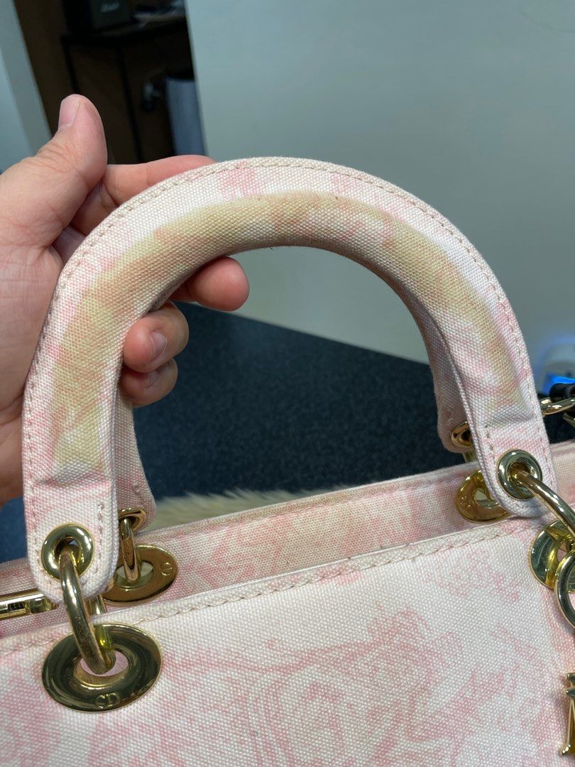 Preloved Lady Dior Sling (Category: Luxury Bags & Wallets) located in Bacoor. Submitted by themlrbagshop2.0 (Listing ID 1277163004, Image 3). Description: Preloved Lady Dior Canvas Bag ✅PM FOR THE PRICE 25cm Intact Canvas Minor Flaw: Stains on the handles due to storage but will provide twillies. ☺️ with sling Disclaimer: Themlrbagshop 2.0 is not associated or affiliated with any brands mentioned. All copyrights reserved to the rightful original 