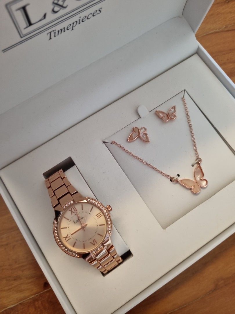 Rose gold watch and necklace earrings set