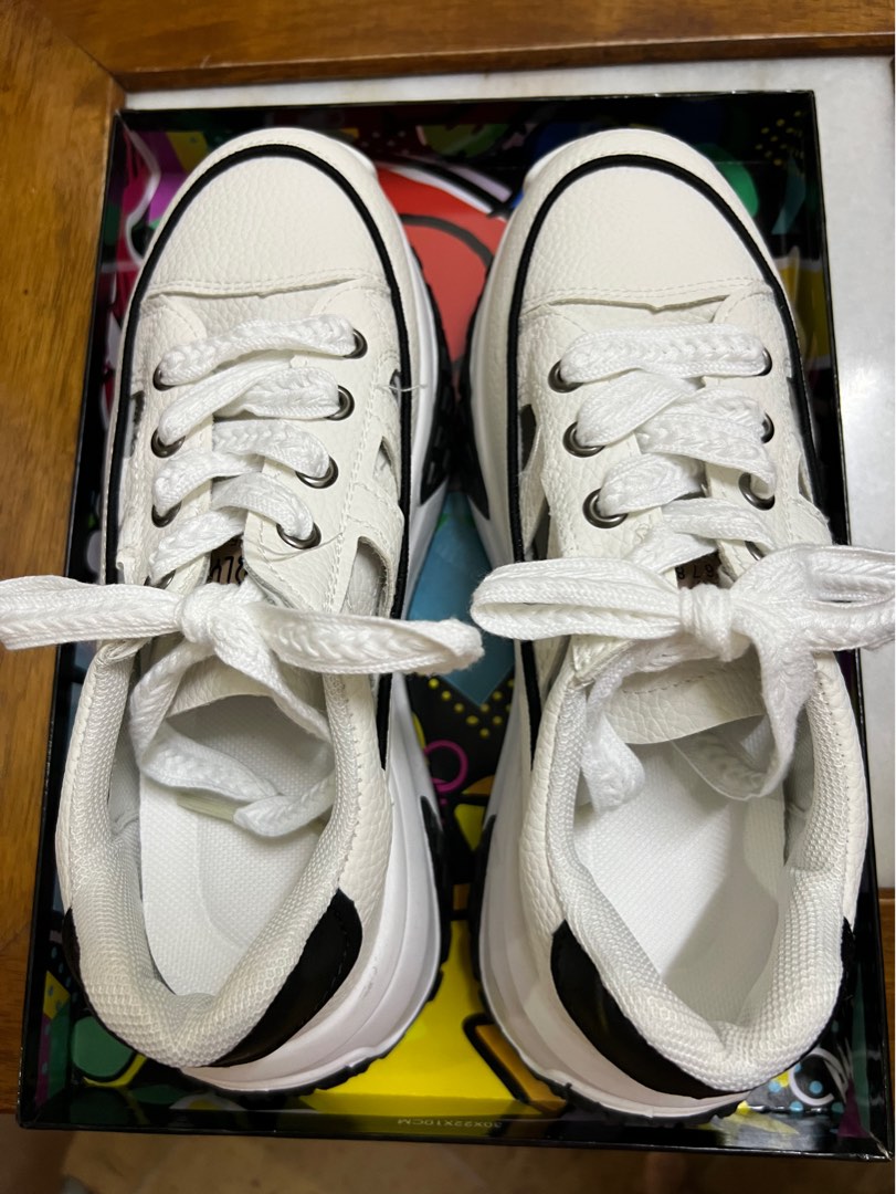 Stylish black white colour soft leather sneakers