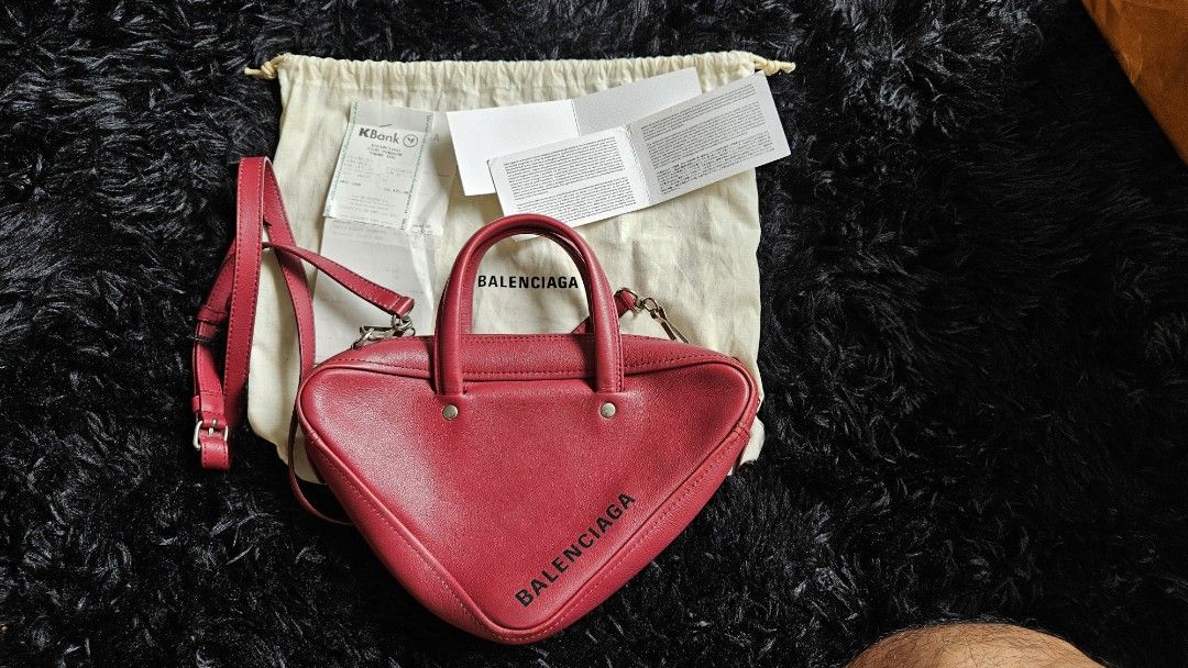 Triangle duffle Luxury Bags Wallets on Carousell