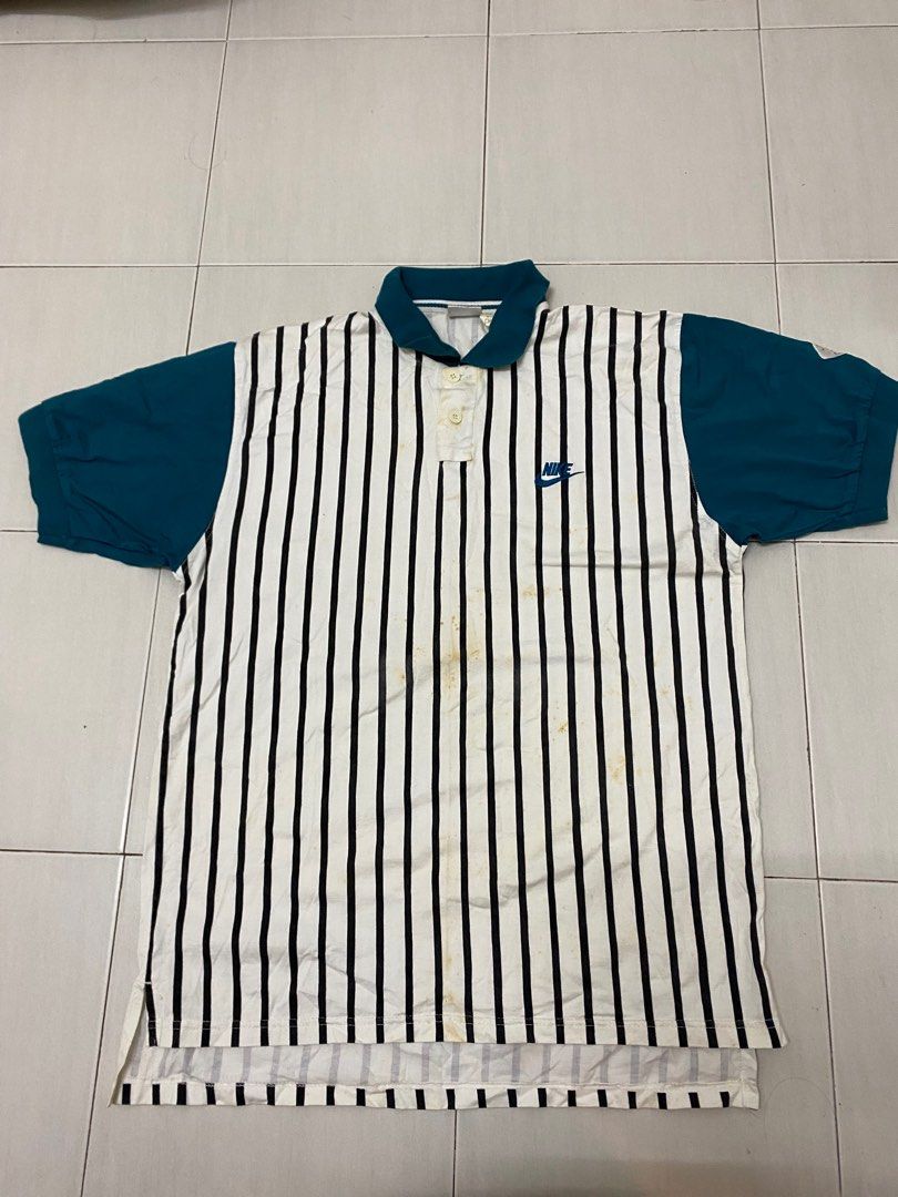 Nike supreme court polo store