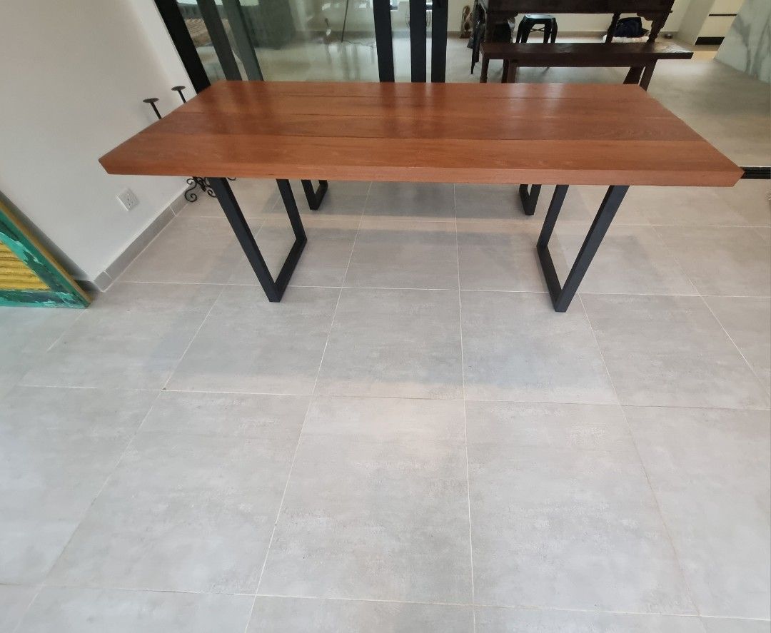 Dining Table+Bench 6FT (solid wood) (Category: Tables & Sets) located in Petaling Jaya. Submitted by quirkdesign (Listing ID 1277495539, Image 3). Description: 6 ft thick solid and heavy wooden table and bench set with metal legs. Price is for 1 table and 1 matching bench PRODUCT DETAILS: Balau solid wood planks Metal Legs DIMENSIONS: Width: 78 cm Length: 182 cm Height: 76 cm Table top wood thickness: 4.4 cm Delivery via lalamove contact us for d