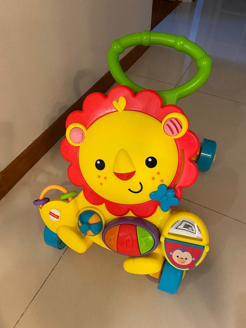 Fisher price musical lion walker cheap