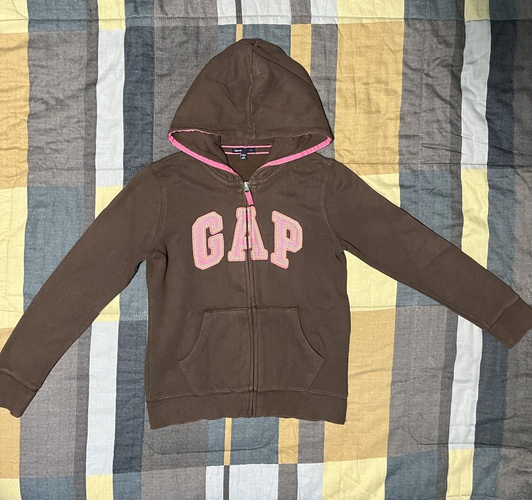 Gap Kids Logo Zip Hoodie (Category: Babies & Kids Fashion) located in Pasig City. Submitted by ldcayas (Listing ID 1277431455, Image 1). Description: Original Gap Kids Logo Hoodie Slightly used Tiny flaw inside the hood (please see last photo) Can fit an adult whose size is XS-S Color: Brown Size : XL (12-13) MOP: Gcash/BPI MOD: Grab/Lalamove/J&T/LBC SF shouldered by the Buyer.