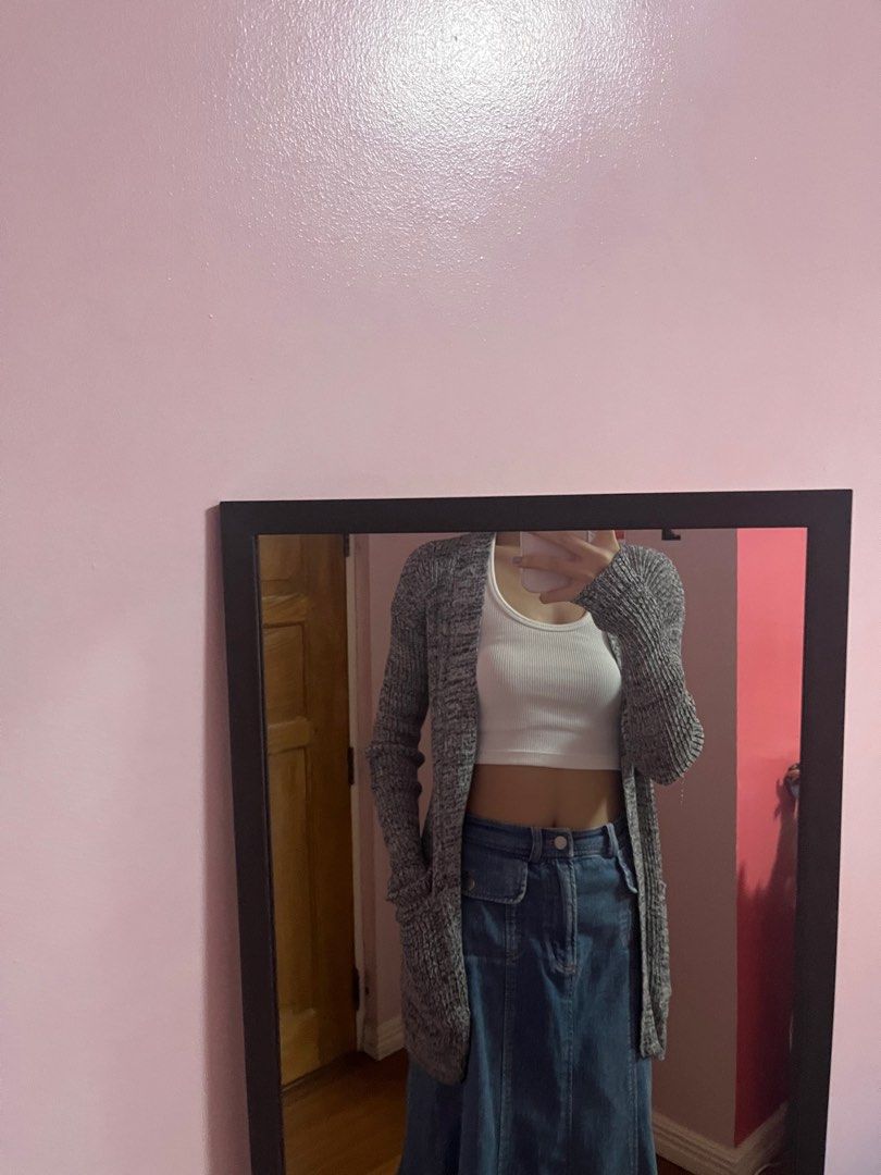 Long knitted gray cardigan (Category: Coats, Jackets and Outerwear) located in Manila. Submitted by ffaayee (Listing ID 1277481232, Image 3). Description: Brand: na Size: XS-S Model size Bust: 31 Waist: 23 Height: 5’5 ✨shipping fee should be shouldered by the buyer ✨loc: mnl/tarlac city ✨mnl meetup: around ust/ espana ✨mop: gcash ✨mod: lalamove (mnl) , ggx .