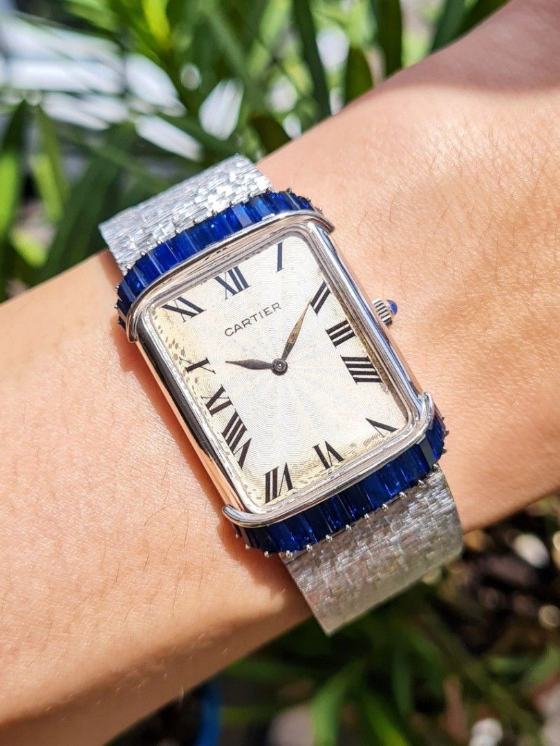 Cartier watch with blue sapphire top