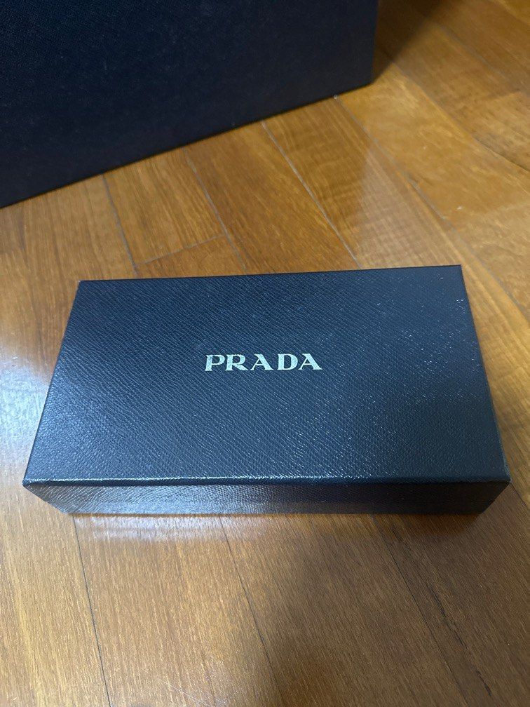 Prada Boxes (Category: Accessories) located in Singapore. Submitted by kerxx (Listing ID 1277477474, Image 3). Description: 3 sizes: Small square (accessories or wallet size) Long rectangle (wallet size) SOLD: Large square box (43cm x 43cm x 21cm) $5 for each or $8 for both Self collect at Pasir Ris or courier $4.30.