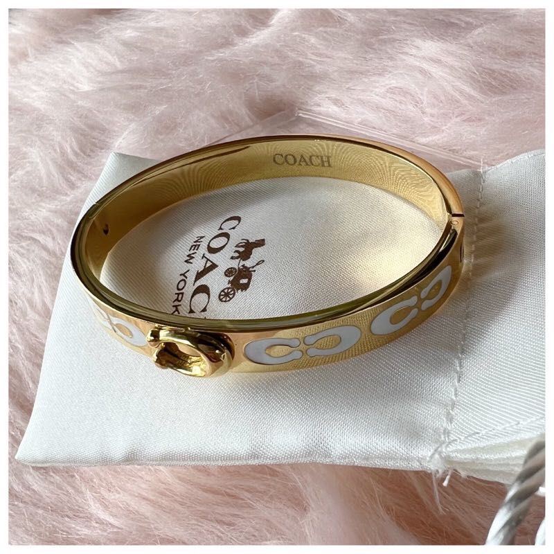 AUTHENTIC COACH LOGO BANGLE (Category: Bracelets) located in Cainta. Submitted by chambieee (Listing ID 1277784698, Image 1). Description: 💯 Original 💯Authentic Circumference: fit up to 6-8inches ✨Made of Stainless Steel ✨FREE Dustbag+ Paperbag ✨Hypo Allergenic ‼️NON TARNISH‼️ ✨ACTUAL/ Detailed photos posted Pwede for men, pang gift for valentine’s 😊.