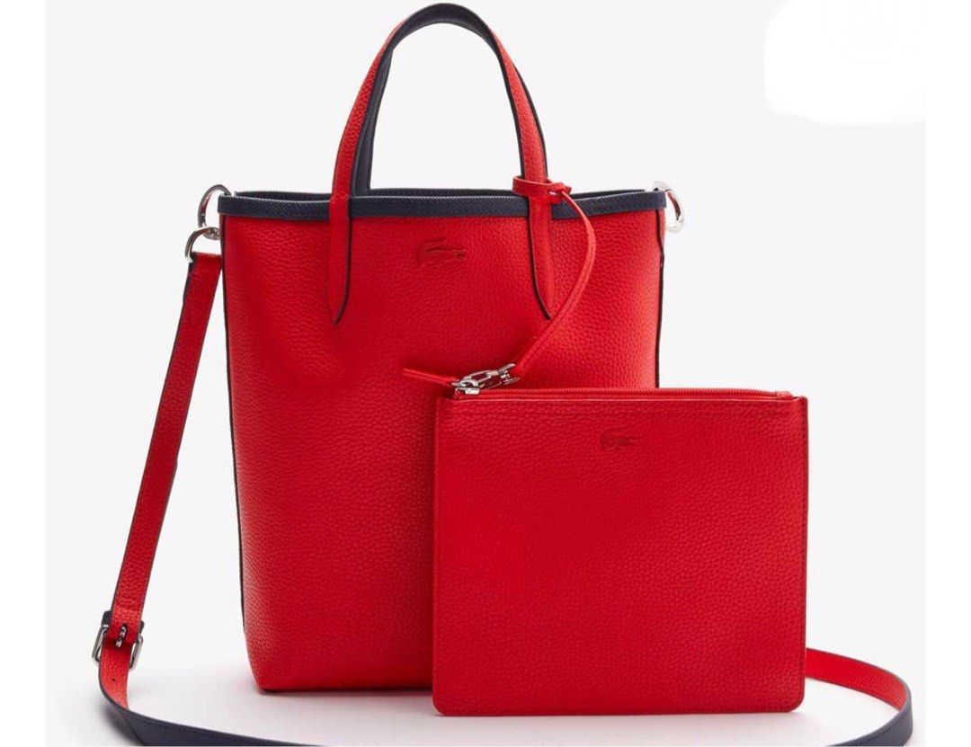 Lacoste reversible bag (Category: Bags & Wallets) located in Singapore. Submitted by wellnessnhealth (Listing ID 1277858952, Image 2). Description: Use a few Times, find the bag too small for me Height 11.0 inches (28 cm) x Width (Top 11.0 inches (28 cm) x Bottom 8.7 inches (22 cm)) x Depth 3 No pockets Weight: 12.2 oz (360 Handle Length: 11.0 inches (28 cm) Comes with a shoulder strap (total length 42.9 inches (1;Accessory Pouch: Height 7.1 inch