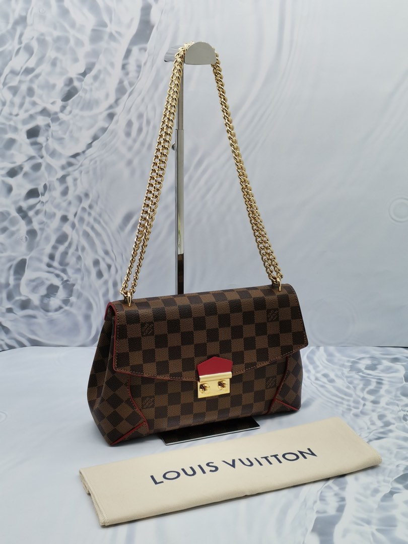 Louis vuitton on sale caissa clutch