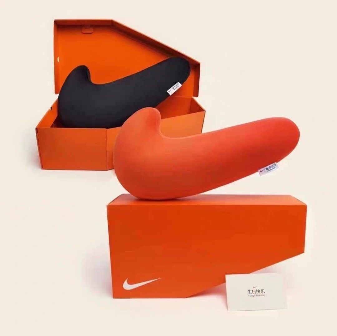 Nike Cushion (Category: Plushies & Soft Toys) located in Singapore. Submitted by jay.rico.12 (Listing ID 1277693496, Image 1). Description: Nike swoosh cushion.
