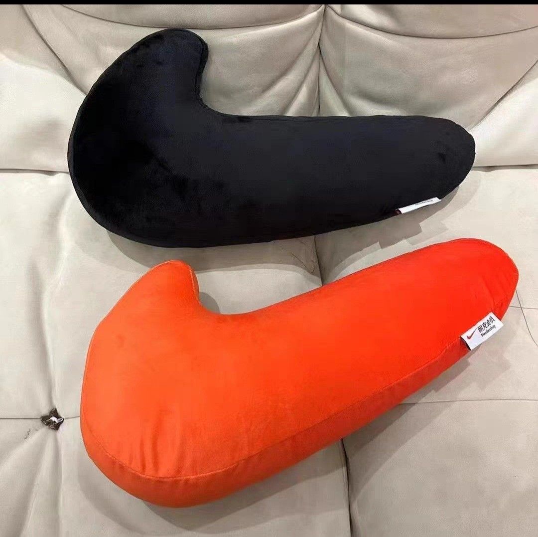Nike Cushion (Category: Plushies & Soft Toys) located in Singapore. Submitted by jay.rico.12 (Listing ID 1277693496, Image 2). Description: Nike swoosh cushion.