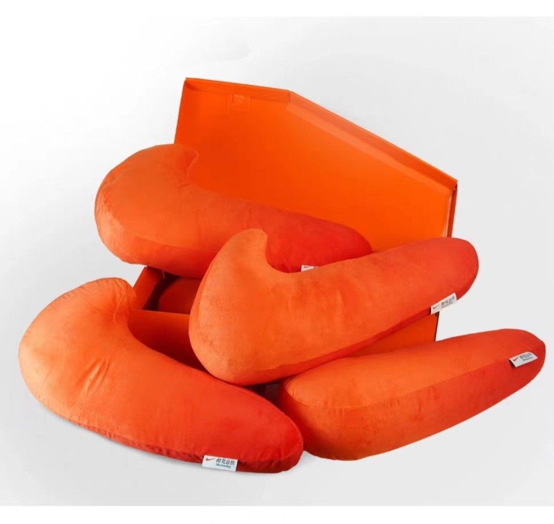 Nike Cushion (Category: Plushies & Soft Toys) located in Singapore. Submitted by jay.rico.12 (Listing ID 1277693496, Image 3). Description: Nike swoosh cushion.