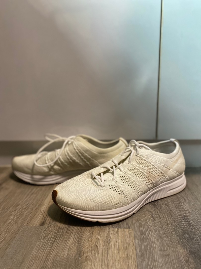 flyknit trainer triple white