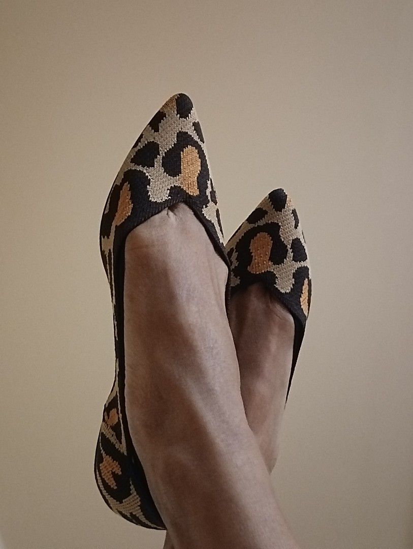 Rothy s The Point Big Cat Size US 7 fits 6.5. Black beige orange leopard animal print pointed toe flats. Washable knit shoes better than leather