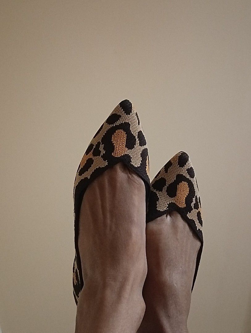 Rothy s The Point Big Cat Size US 7 fits 6.5. Black beige orange leopard animal print pointed toe flats. Washable knit shoes better than leather